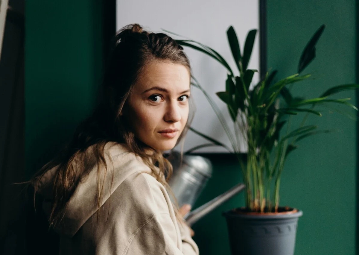 Young woman looking uncertain and anxious before a dental appointment